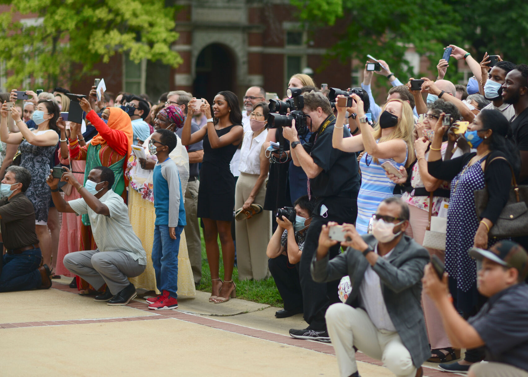 Family and friends gather to take photos